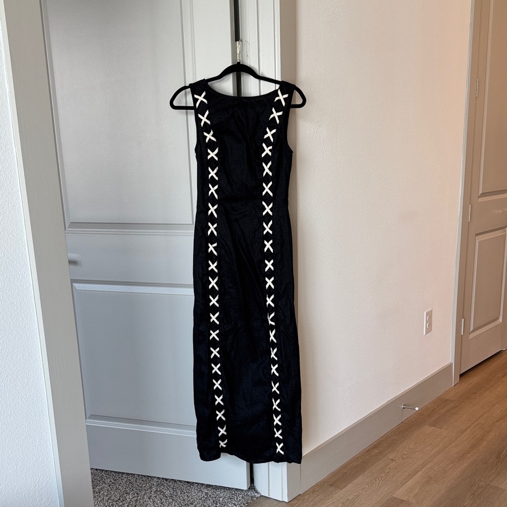 Chic Black Maxi Dress with White Accents and Open Back